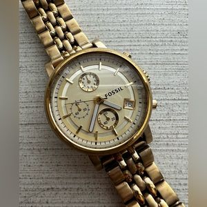 Fossil gold watch.